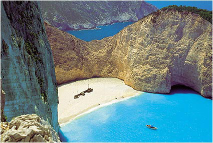 SHIPWRECK - Another worthwhile sight on Zakynthos, which has made the rounds of the island through postcards that represent it on every occasion, is the Navayio (Shipwreck or Smuggler's Cove) on its west side. Definitely one of the most famous and the most photograp by Manolis Tsantakis